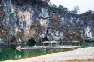 Traditional raft by cliff in Yeongwol